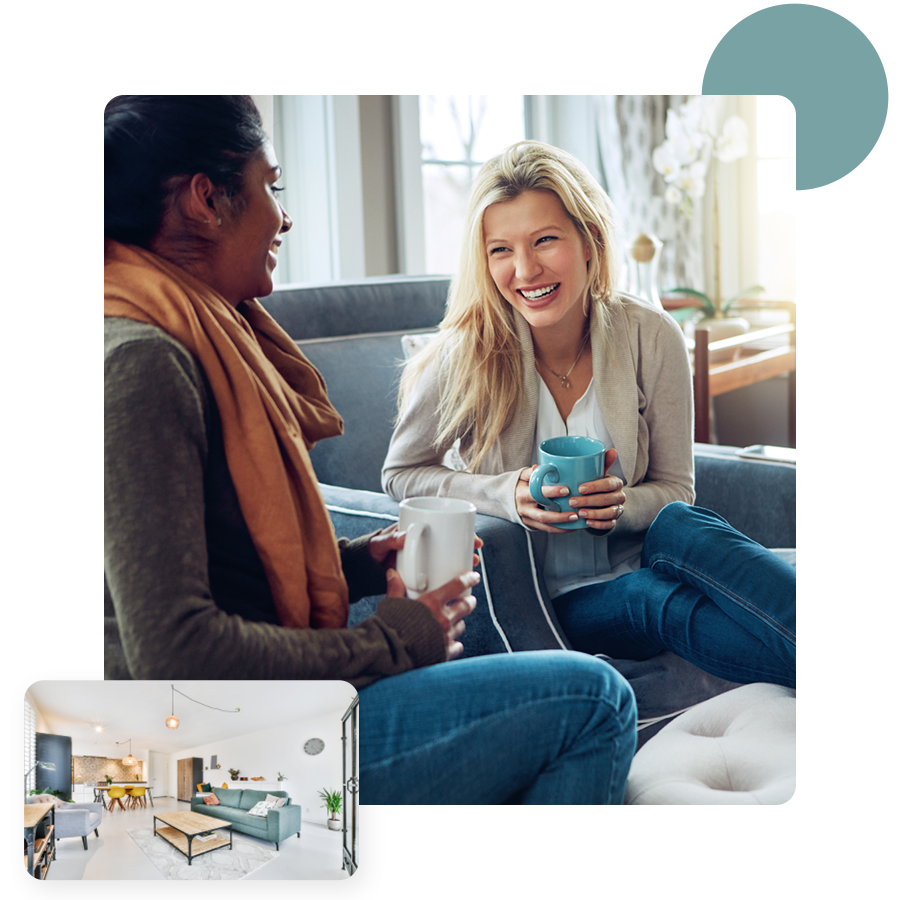Friends enjoying tea together in a clean, comfortable home